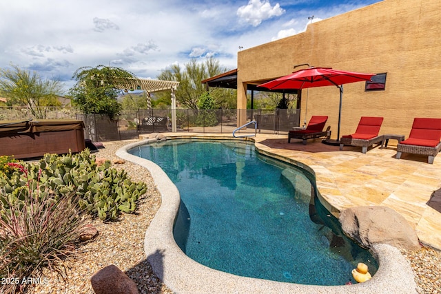 view of pool featuring a patio area, a hot tub, fence, and a fenced in pool