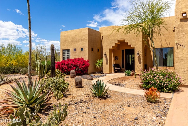 view of front of home with stucco siding