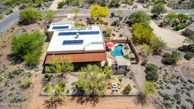 birds eye view of property with view of desert