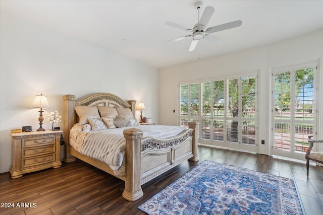 bedroom with dark wood-type flooring, ceiling fan, and access to outside