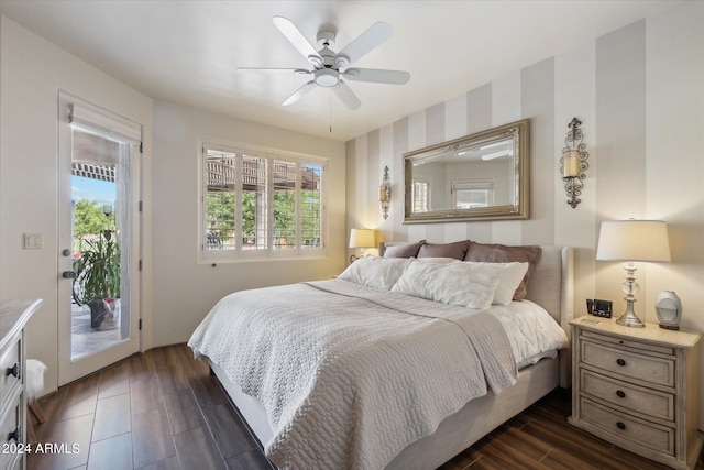 bedroom featuring ceiling fan, dark hardwood / wood-style flooring, and access to exterior