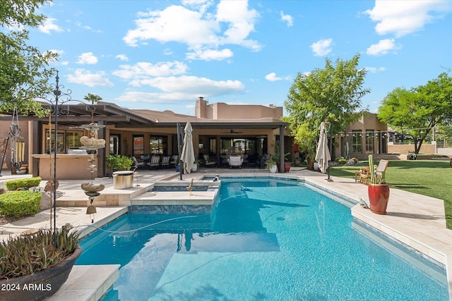 view of swimming pool with a patio