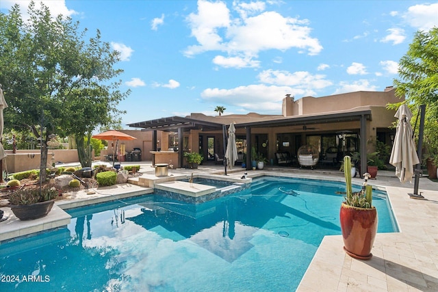 view of pool with a pergola and a patio area