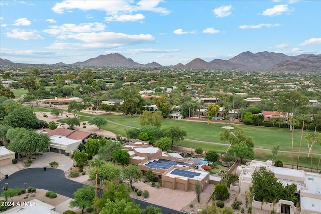 birds eye view of property featuring a mountain view