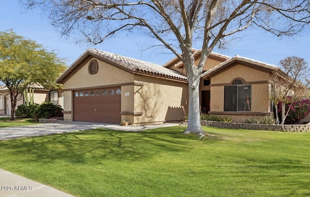 view of front of home featuring stucco siding, an attached garage, driveway, a tiled roof, and a front lawn