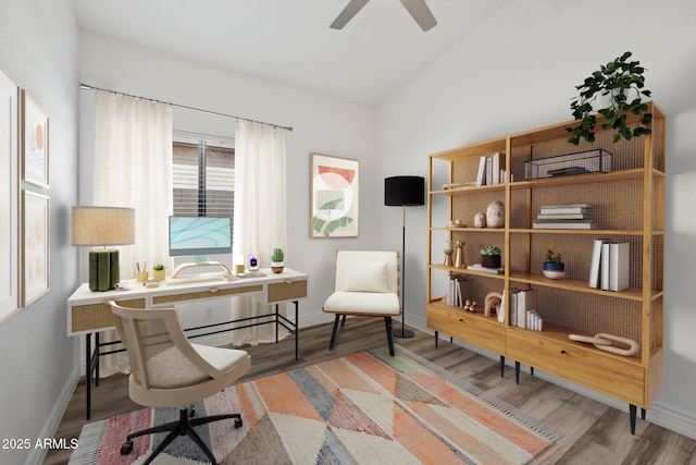 sitting room featuring lofted ceiling, ceiling fan, baseboards, and wood finished floors