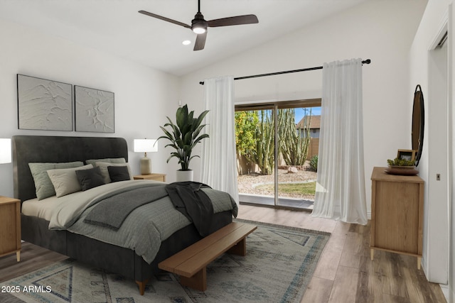 bedroom with lofted ceiling, ceiling fan, recessed lighting, wood finished floors, and access to exterior