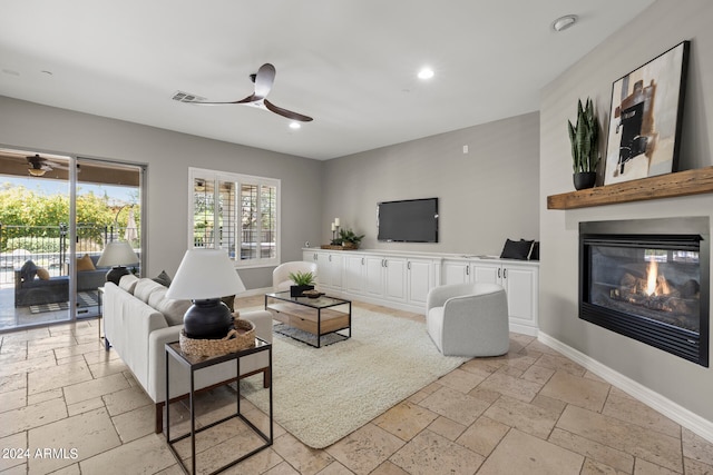 living room featuring ceiling fan