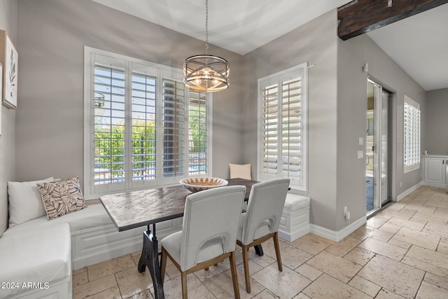 dining room with a notable chandelier and a healthy amount of sunlight