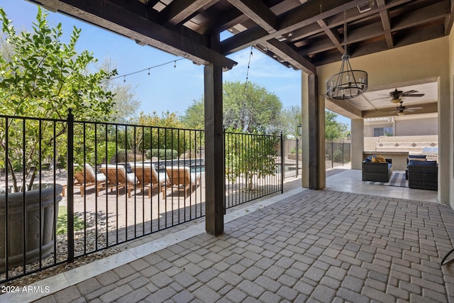 view of patio / terrace featuring ceiling fan