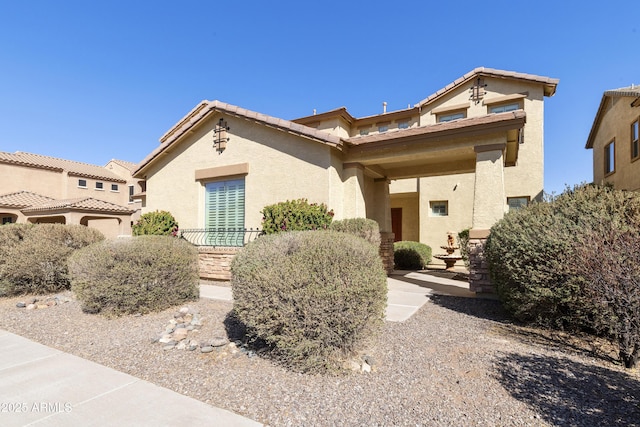 view of front of home featuring stucco siding