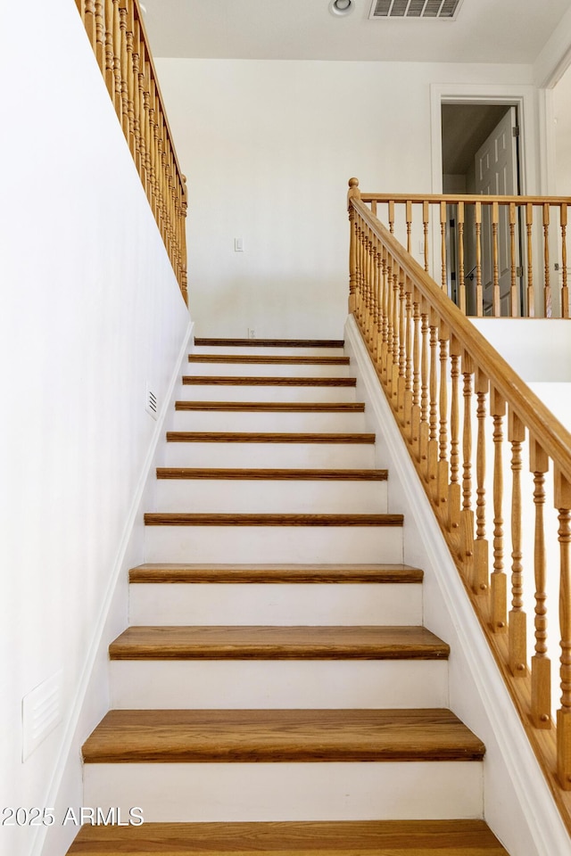 stairs featuring visible vents