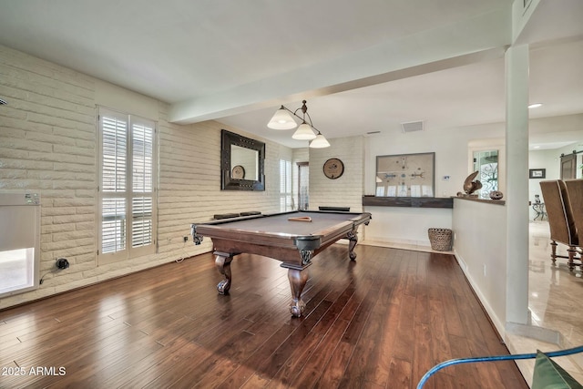 playroom with pool table, wood finished floors, visible vents, and brick wall