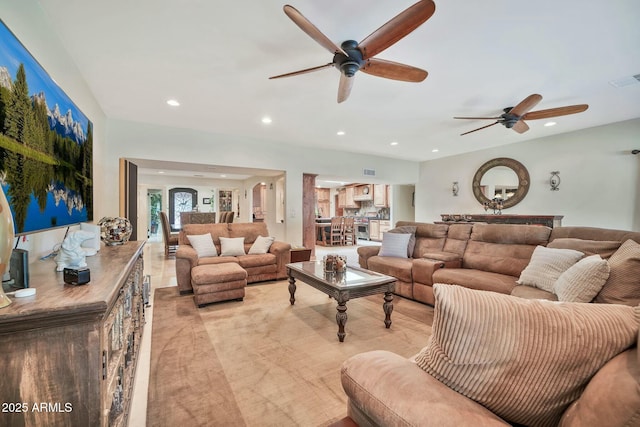 living area featuring recessed lighting, visible vents, and ceiling fan