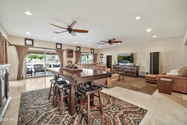 dining room featuring light tile patterned floors, visible vents, recessed lighting, and a ceiling fan