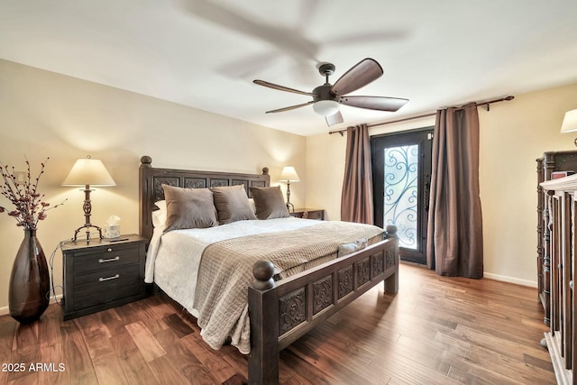 bedroom with a ceiling fan, access to exterior, baseboards, and dark wood-style flooring