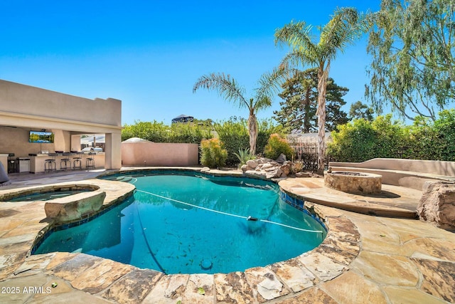 view of pool featuring a fenced in pool, a patio, an outdoor fire pit, and a fenced backyard