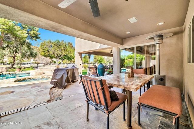 view of patio featuring an outdoor pool, a grill, and outdoor dining space