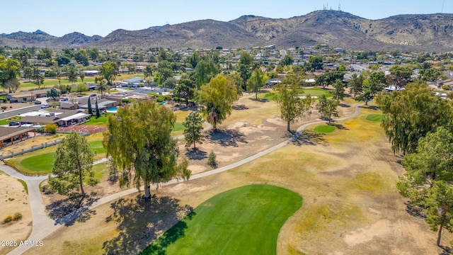 aerial view with golf course view, a residential view, and a mountain view