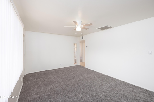 carpeted empty room with ceiling fan