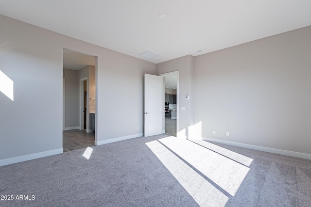 unfurnished bedroom featuring carpet flooring