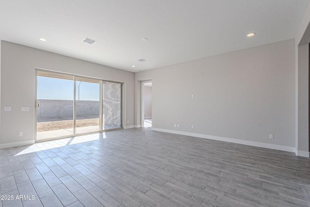 unfurnished room featuring light hardwood / wood-style flooring