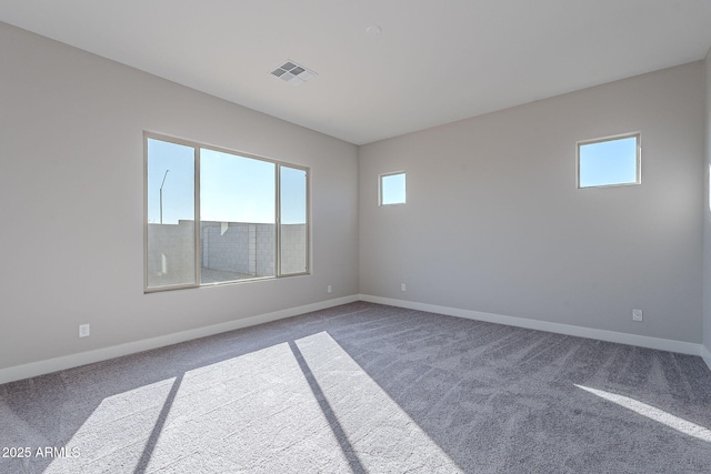 view of carpeted spare room