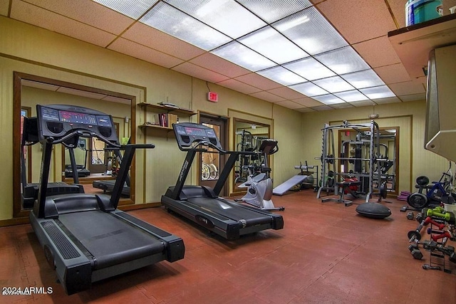 gym with a drop ceiling