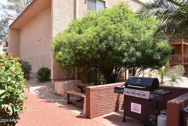 view of patio with a grill