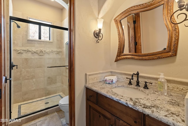 11550 E Paradise Ln, Scottsdale, AZ 85255 - bathroom featuring toilet, vanity, and a shower stall