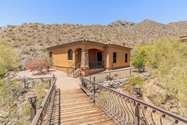 11550 E Paradise Ln, Scottsdale, AZ 85255 - view of front of house with stucco siding, a mountain view, and a tiled roof
