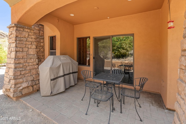 11550 E Paradise Ln, Scottsdale, AZ 85255 - view of patio / terrace featuring grilling area and outdoor dining space