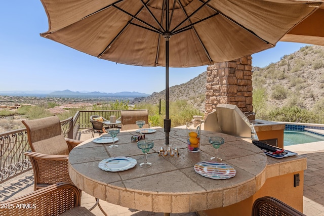 11550 E Paradise Ln, Scottsdale, AZ 85255 - view of patio / terrace featuring a mountain view and outdoor dining area