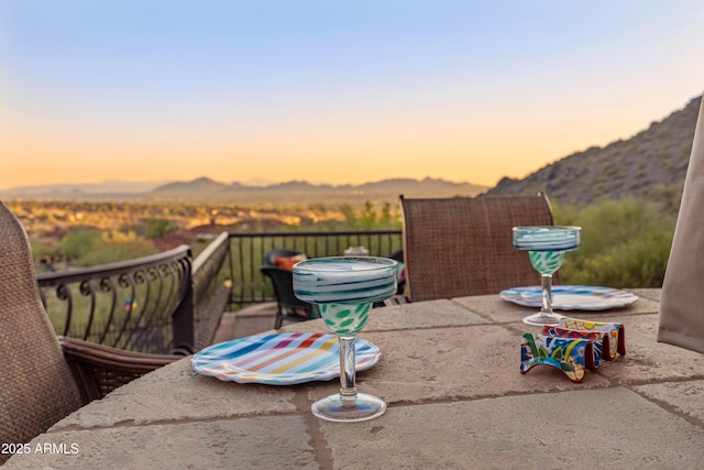 11550 E Paradise Ln, Scottsdale, AZ 85255 - patio terrace at dusk with a mountain view
