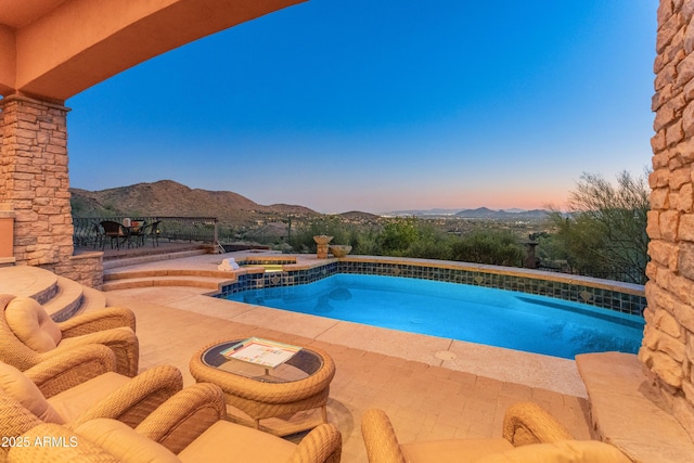 11550 E Paradise Ln, Scottsdale, AZ 85255 - view of swimming pool with a patio area, a mountain view, and a pool with connected hot tub