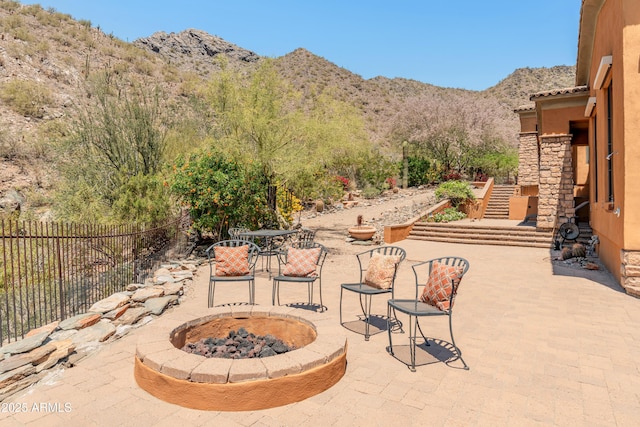 11550 E Paradise Ln, Scottsdale, AZ 85255 - view of patio featuring a fire pit, a mountain view, and stairway