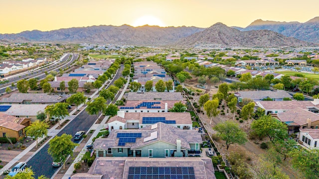 20784 W Minnezona Ave, Buckeye, AZ 85396 - aerial view at dusk of a mountain view and a residential view