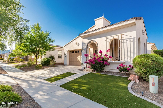 20784 W Minnezona Ave, Buckeye, AZ 85396 - mediterranean / spanish-style home with concrete driveway, an attached garage, stucco siding, a chimney, and a tiled roof