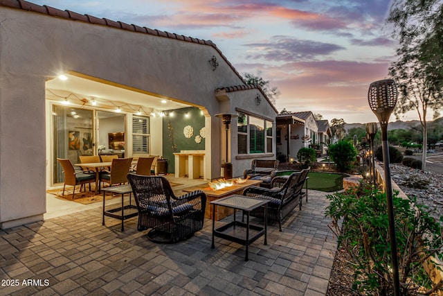 20784 W Minnezona Ave, Buckeye, AZ 85396 - view of patio featuring an outdoor living space with a fire pit