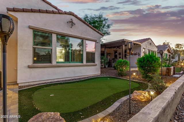 20784 W Minnezona Ave, Buckeye, AZ 85396 - view of yard featuring a putting area and ceiling fan