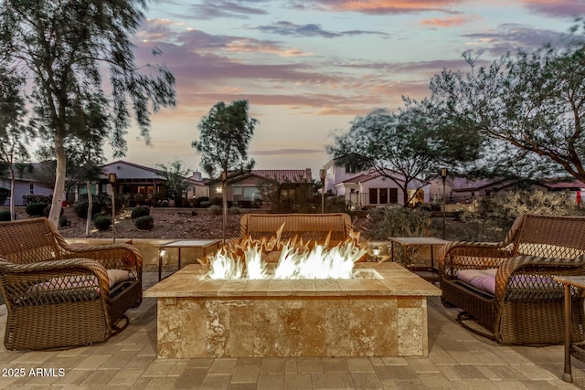 20784 W Minnezona Ave, Buckeye, AZ 85396 - view of patio / terrace with a fire pit