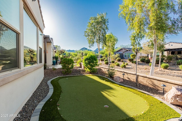 20784 W Minnezona Ave, Buckeye, AZ 85396 - view of yard featuring an area to practice putting and a mountain view
