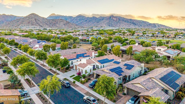 20784 W Minnezona Ave, Buckeye, AZ 85396 - aerial view at dusk of a residential view and a mountain view