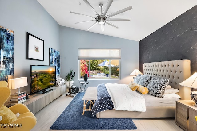 bedroom featuring lofted ceiling and ceiling fan