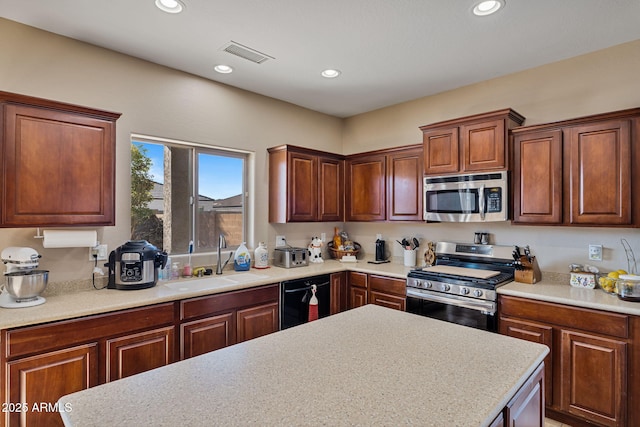 kitchen featuring sink, appliances with stainless steel finishes, and wine cooler