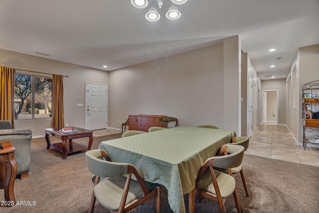 dining space with light tile patterned flooring