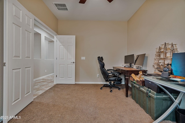 carpeted office with ceiling fan