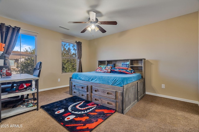 carpeted bedroom with ceiling fan