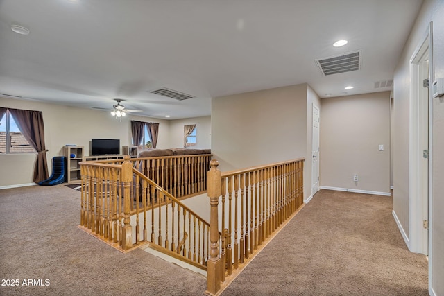 corridor with carpet floors