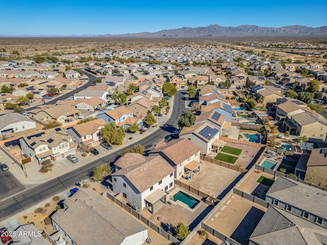 drone / aerial view featuring a mountain view